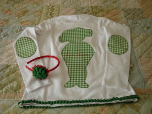 Camiseta muñequita tonos verdes. Trasera