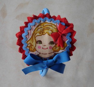 Diadema muñequita azules